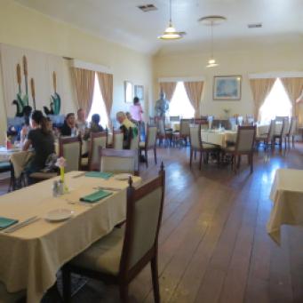 A group had decided to eat in the dining room that was originally the ballroom